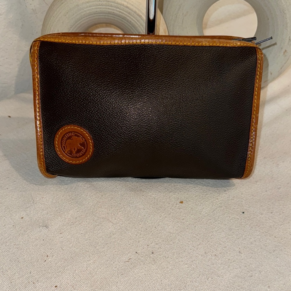 Brown Cosmetic Bag with Structured Design and Classic Appeal